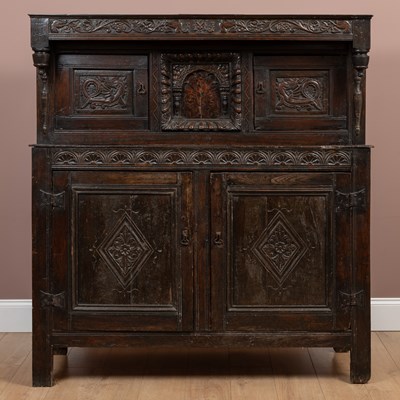 Lot 366 - An antique Welsh oak Deuddarn cupboard