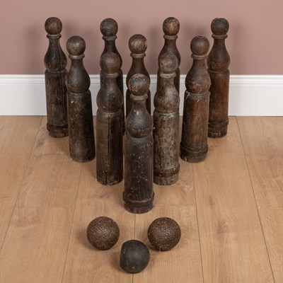 Lot 1291 - An antique game of skittles