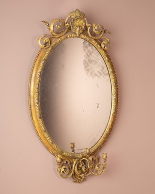 Lot 385 - A gilt framed oval girandole wall mirror