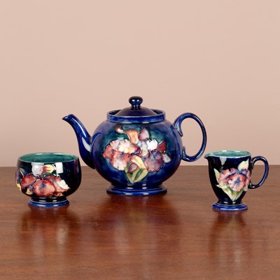 Lot 1132 - A Moorcroft pottery three-piece tea set