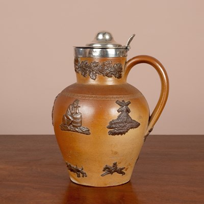 Lot 427 - A George III stoneware ale jug