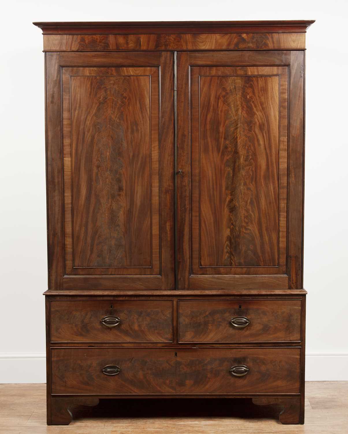 Lot 24 - Mahogany linen press 19th Century, with...