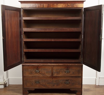 Lot 24 - Mahogany linen press 19th Century, with...