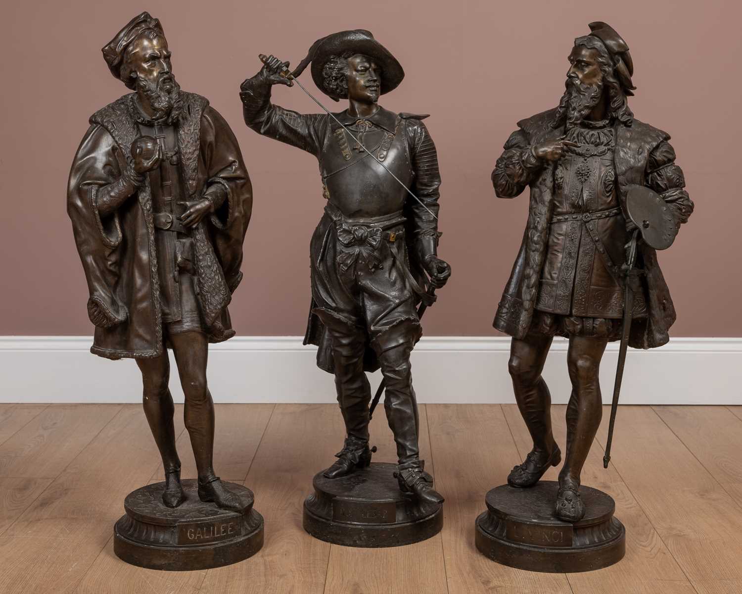 Lot 712 - Three 19th century spelter sculptures of gentlemen