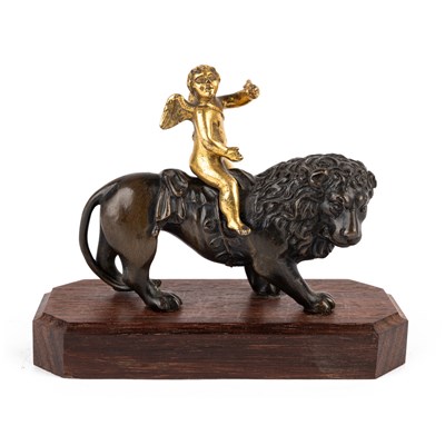 Lot 494 - A bronze and ormolu desk ornament