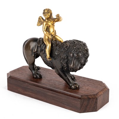 Lot 494 - A bronze and ormolu desk ornament