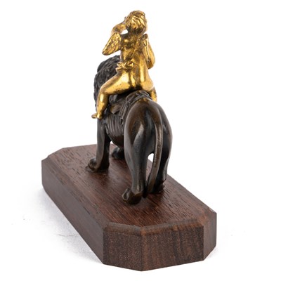 Lot 494 - A bronze and ormolu desk ornament