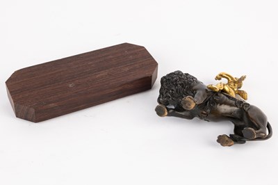 Lot 494 - A bronze and ormolu desk ornament