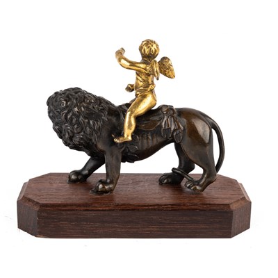 Lot 494 - A bronze and ormolu desk ornament