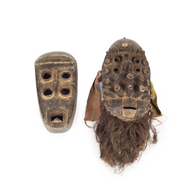 Lot 1057 - Two Grebo masks