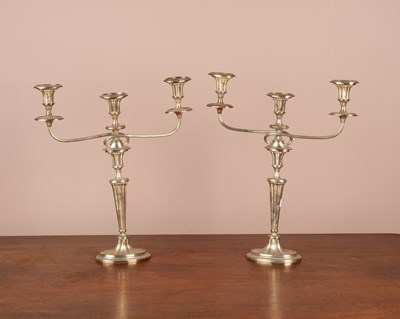Lot 142 - A pair of Adam style silver-plated candelabra