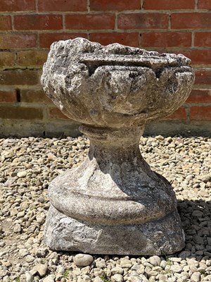 Lot 1260 - An antique cast reconstituted stone garden urn or planter