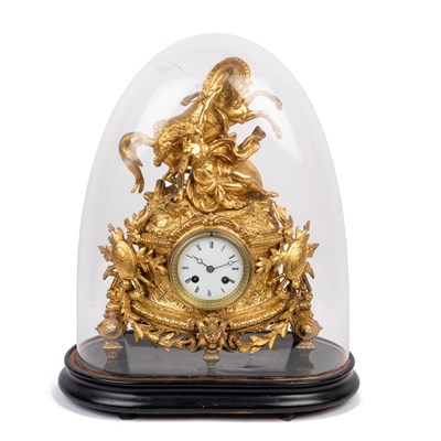 Lot 96 - A French gilt metal mantel clock