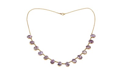 Lot 283 - An amethyst fringe necklace, the trace-link...