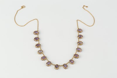Lot 283 - An amethyst fringe necklace, the trace-link...
