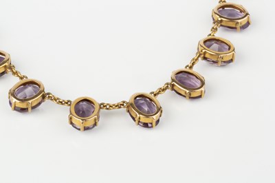 Lot 283 - An amethyst fringe necklace, the trace-link...