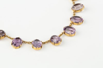 Lot 283 - An amethyst fringe necklace, the trace-link...
