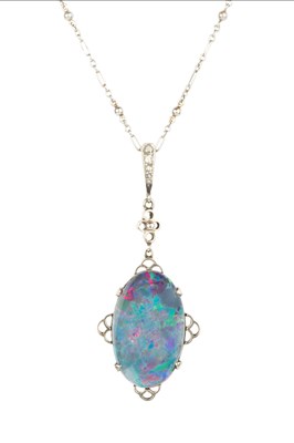 Lot 278 - An opal doublet and diamond pendant, white...