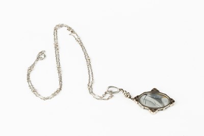 Lot 278 - An opal doublet and diamond pendant, white...