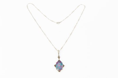Lot 278 - An opal doublet and diamond pendant, white...