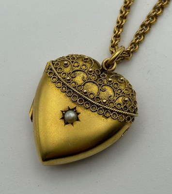 Lot 11 - A Victorian heart-shaped locket pendant, with...