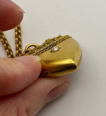 Lot 11 - A Victorian heart-shaped locket pendant, with...