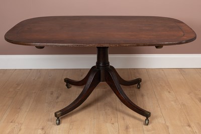 Lot 207 - A Regency mahogany tilt top dining table