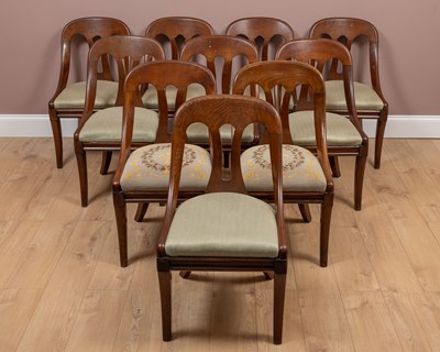 Lot 391 - A set of ten early 19th century gondola dining chairs