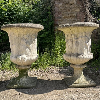 Lot 1219 - A pair of garden urns