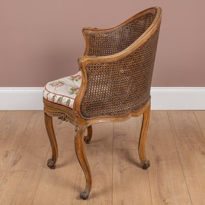 Lot 1175 - A French Rococo style desk chair