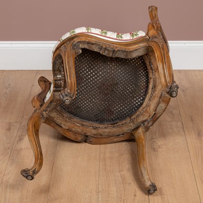 Lot 1175 - A French Rococo style desk chair