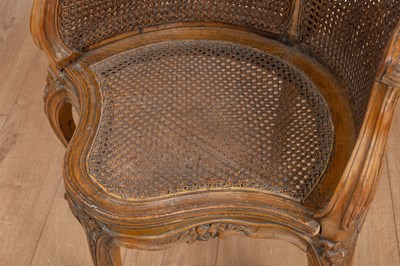 Lot 1175 - A French Rococo style desk chair