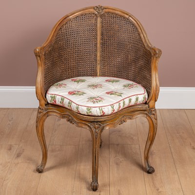 Lot 1175 - A French Rococo style desk chair