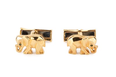 Lot A pair of elephant cufflinks by Cartier, each...