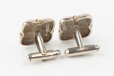 Lot A pair of silver cufflinks by Tiffany & Co.,...
