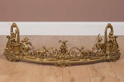 Lot 223 - A 19th century ormolu fender decorated with hunting putti