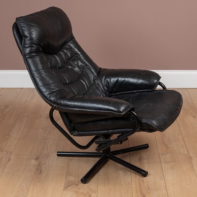 Lot 1049 - A Skoghaug Industries reclining swivel armchair