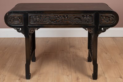 Lot 1144 - An early 20th century Chinese hardwood altar table