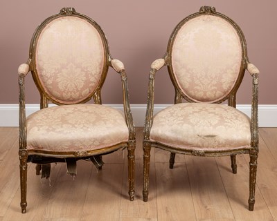 Lot 301 - A pair of French style Georgian oval-backed open armchairs