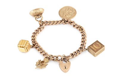 Lot 70 - A charm bracelet, the curb-link bracelet...