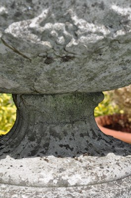 Lot 1221 - A lidded urn or finial on a plinth base
