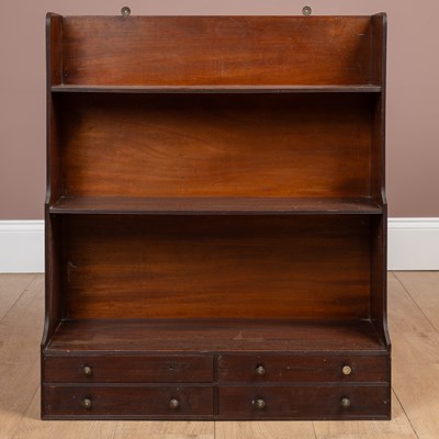 Lot 415 - A Regency mahogany hanging bookshelf