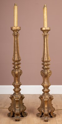 Lot 452 - A pair of Continental floor standing torchères or candlesticks