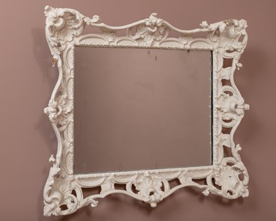 Lot 308 - An antique decorative wall mirror