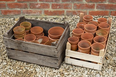 Lot 1323 - Two wooden crates of various old terracotta flower pots