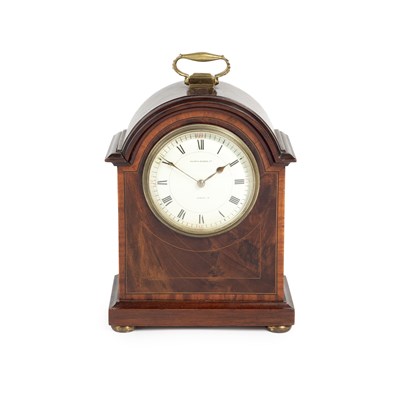 Lot 1198 - An Edwardian mahogany mantel timepiece