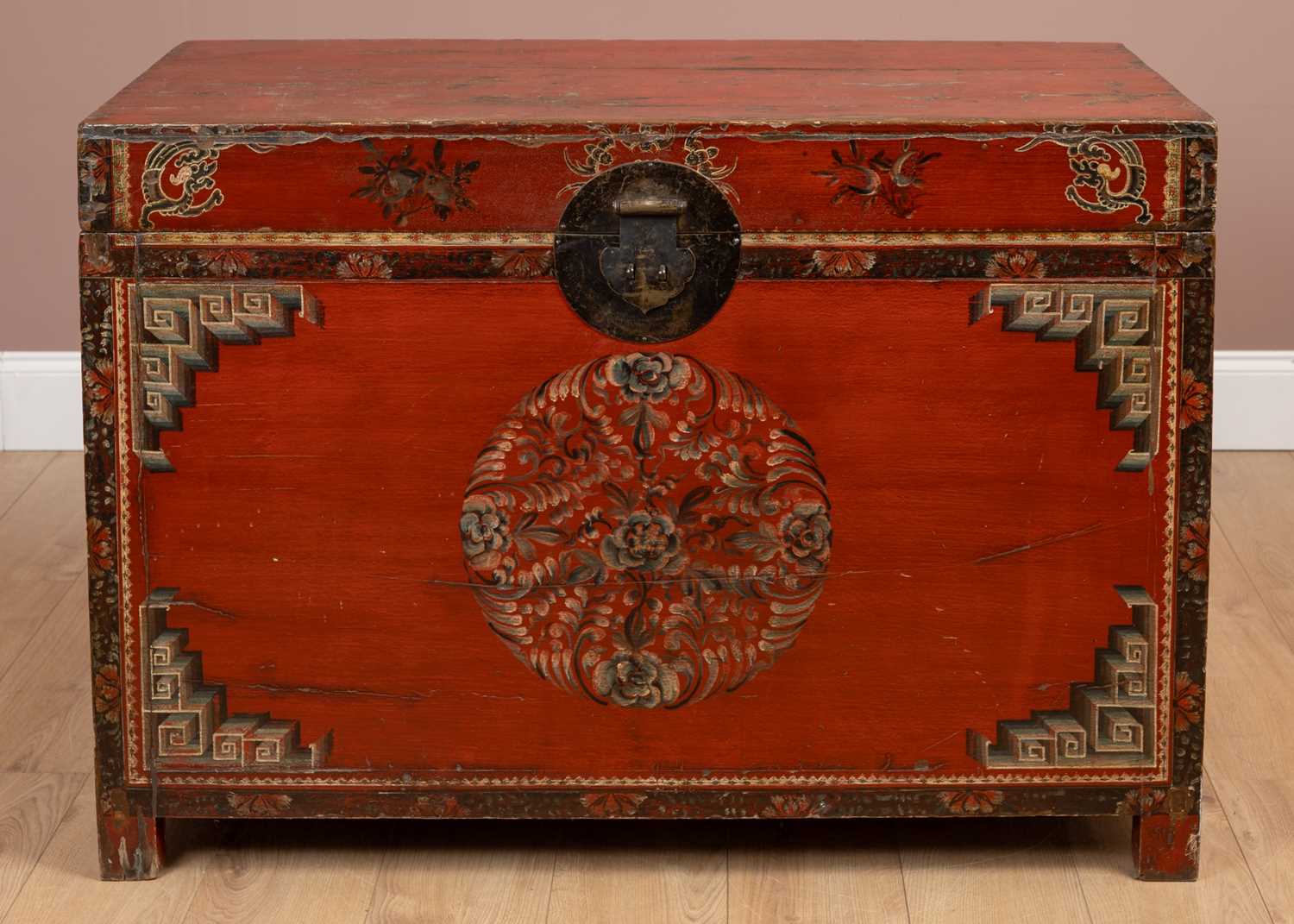 Lot 182 - A 20th century Korean red lacquered and hand decorated storage chest