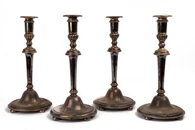 Lot 376 - A set of four silver plated candlesticks