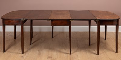 Lot 394 - A George III mahogany D-end dining table