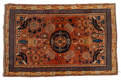 Lot 512 - An Oriental rug